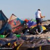 Evo from North and Envy from Liquid Force are prepared on the beach